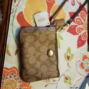 Small brown wristlet